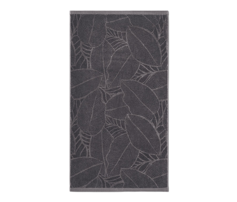 Ein anthrazitfarbenes Jacquard-Badetuch mit Blattmuster.