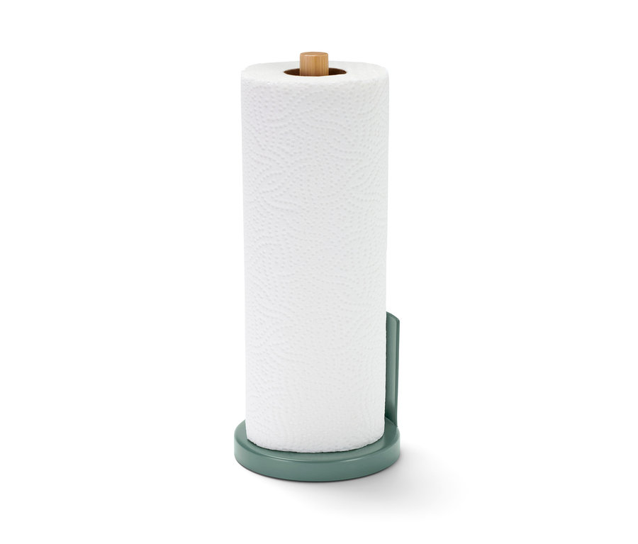 Eine Küchenrolle aus Papier auf einem grünen Küchenrollenhalter mit hellbrauner Spitze.