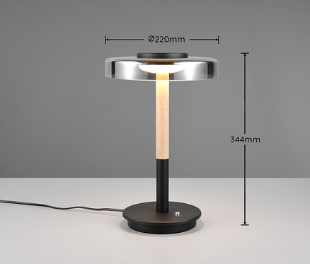 Detailaufnahme der Trio LED-Tischleuchte »Celeste« auf einem weißen Tisch.