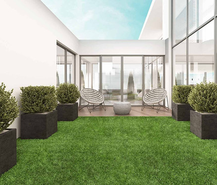Terrasse mit Primaflor Kunstrasen »WOODLAND« und Sitzgelegenheit.