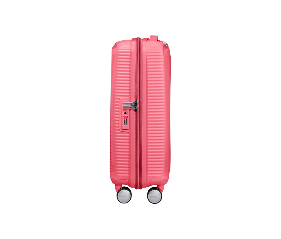 Detailaufnahme eines sun kissed coral farbenen American Tourister Hartschalen-Koffers »Soundbox« Spinner, klein.