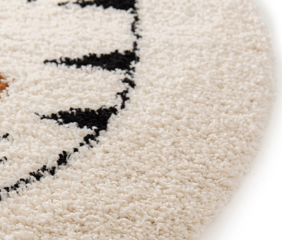 Detailansicht des Kinderteppichs NOMAD Tiger, Ø ca. 135 cm.