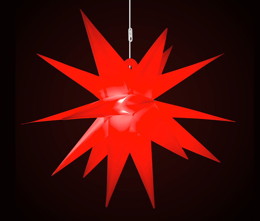 Ein roter AMARE XXL-LED-Stern mit 100 cm Durchmesser hängt vor einem dunklen Hintergrund.