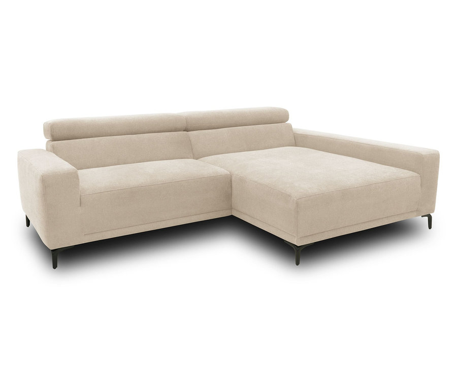 Cremefarbenes DOMO collection Sofa mit Armlehne rechts.
