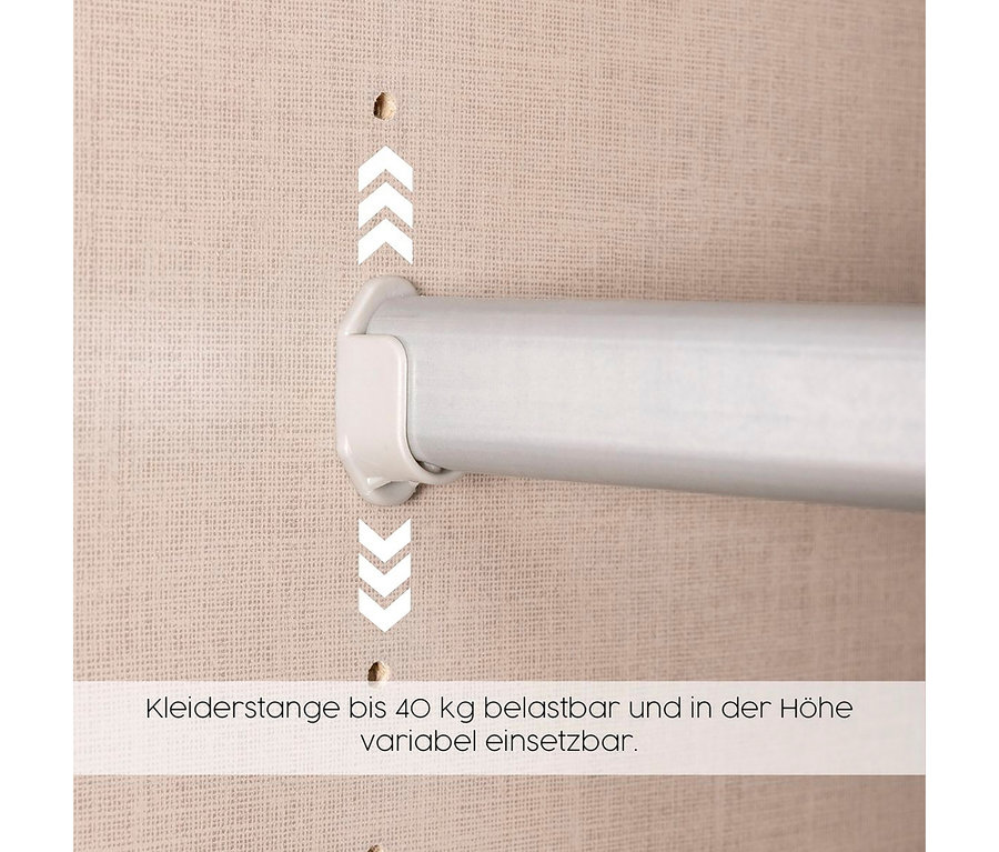 Detailaufnahme einer Kleiderstange im Rauch Drehtürenschrank "Skandi" 4-türig mit zwei Schubladen, beige/champagner.