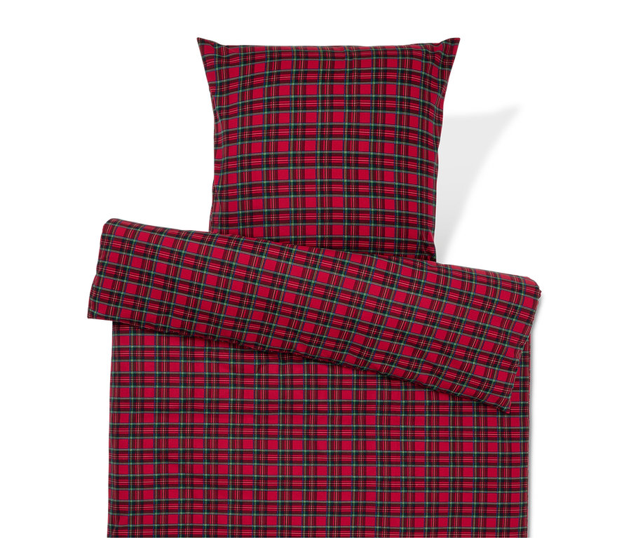 Rot karierte Bettwäsche und Kissen.