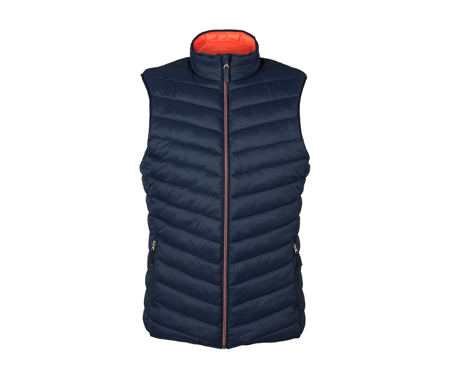 Marineblaue Wende-Steppweste mit orangefarbener Innenseite.