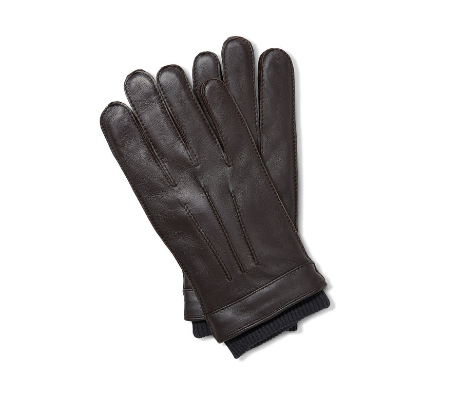 Zwei Leder-Handschuhe auf weißem Hintergrund.
