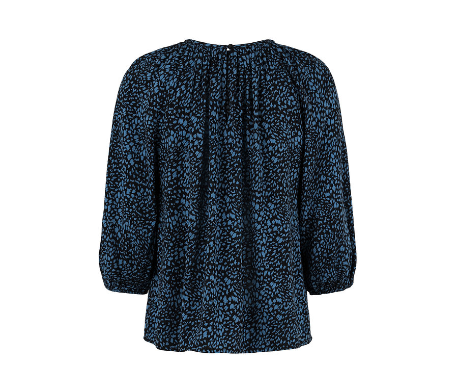 Eine blaue Bluse mit Print.