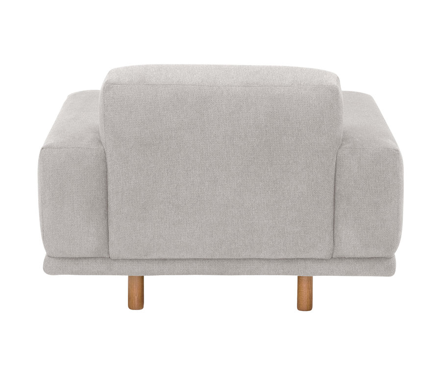 Rückansicht des silberfarbenen Sessels „Penelope“.