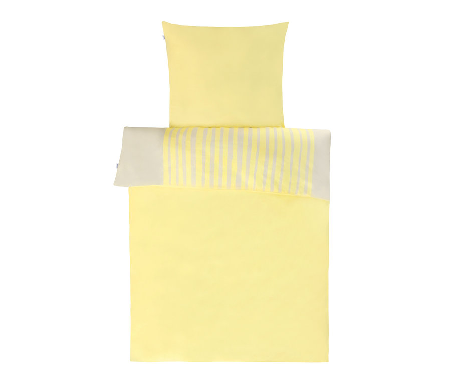 Gelbe SCHÖNER WOHNEN-Kollektion Bettwäsche mit Kissen oben.