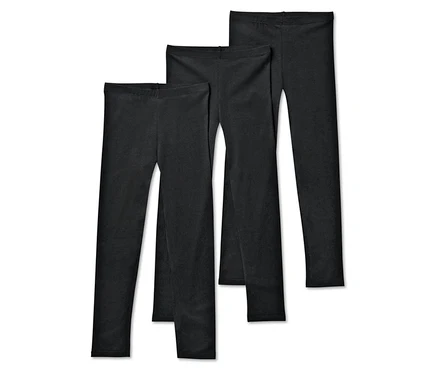 Drei schwarze Leggings liegen nebeneinander.