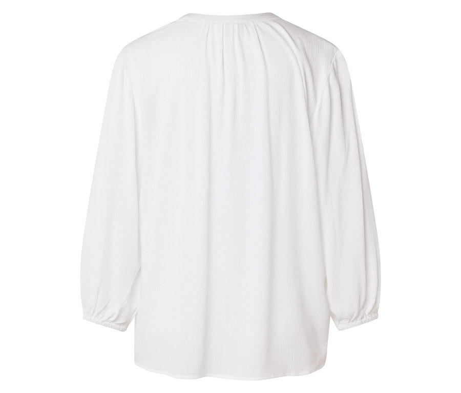 Rückansicht einer weißen, langärmeligen Bluse.