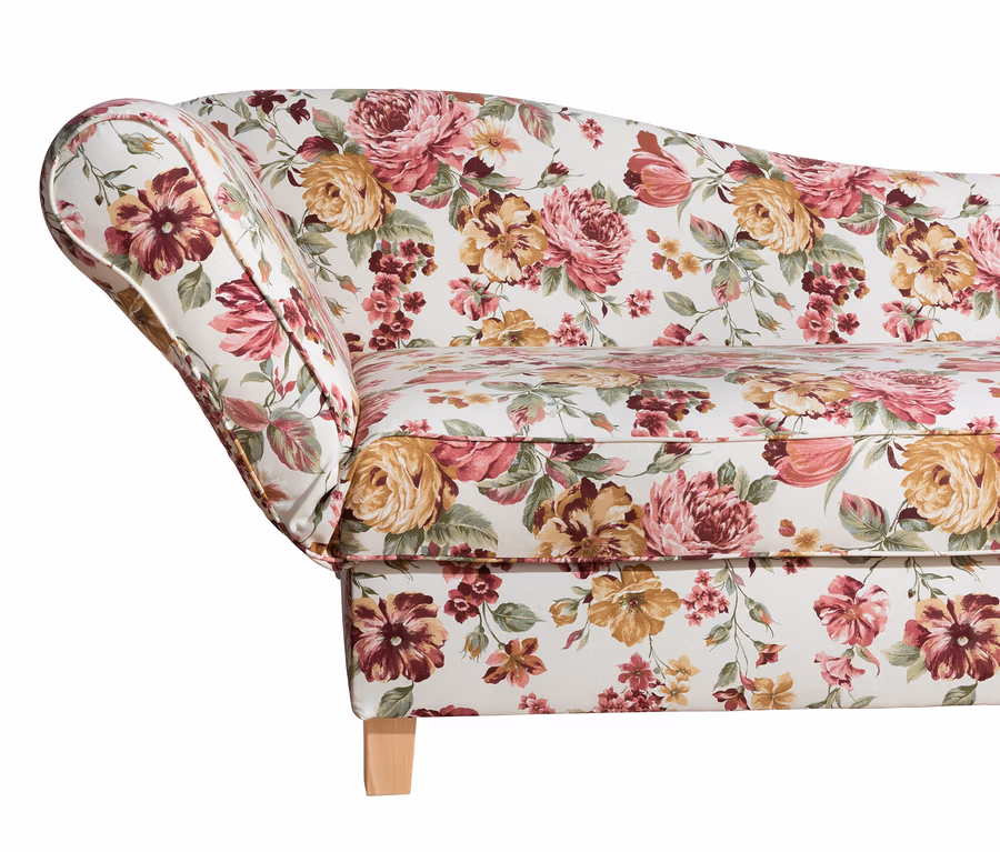 Detailansicht der linken Seite der Max-Winzer®-Recamiere »Saturn« mit floralem Muster.