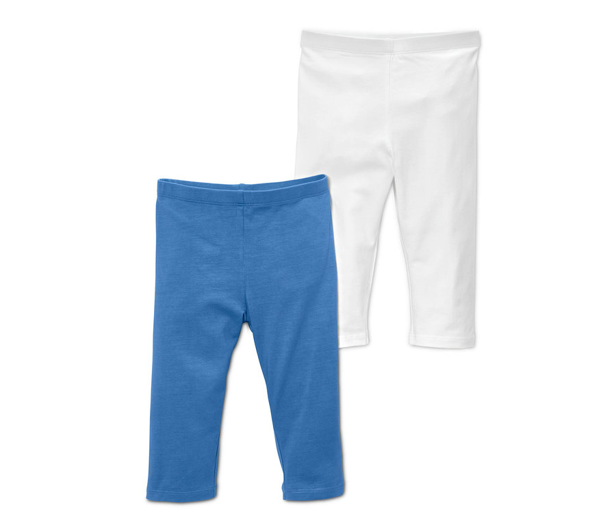 Zwei Leggings, eine blaue und eine weiße.