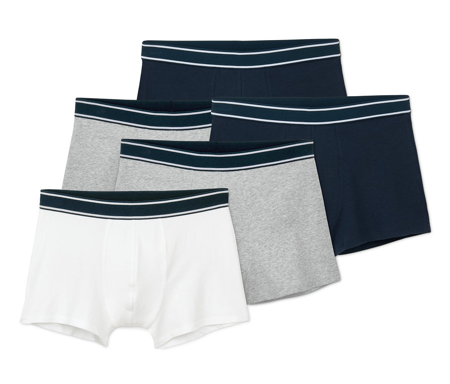 Fünf Slipboxer in Weiß, Grau und Dunkelblau.