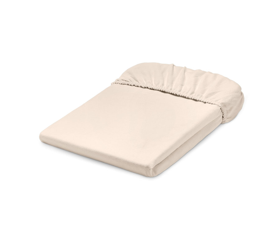 Beige Biber-Spannbettlaken.