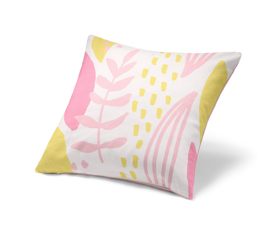 Dekokissen-Bezug mit Blattprint in Rosa und Gelb auf weißem Hintergrund.