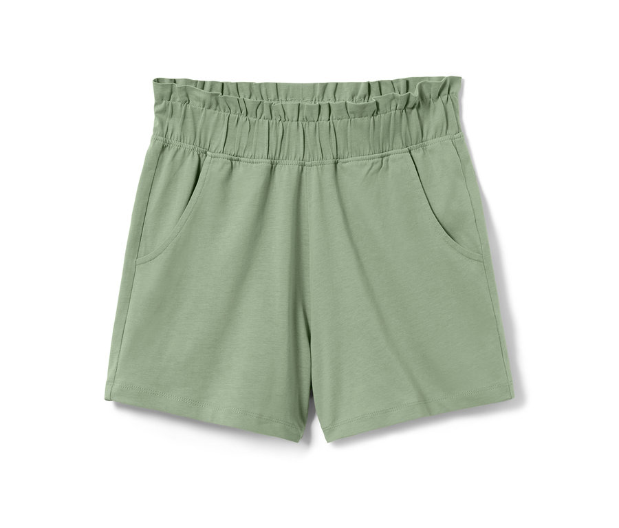 Eine einzelne grüne Kinder-Jersey-Shorts mit elastischem Bund und Taschen.