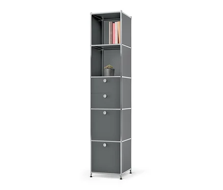 Graues Metallregal »CN3« mit 2 Klappfächern, 2 Schubladen, Büchern und Pflanze.