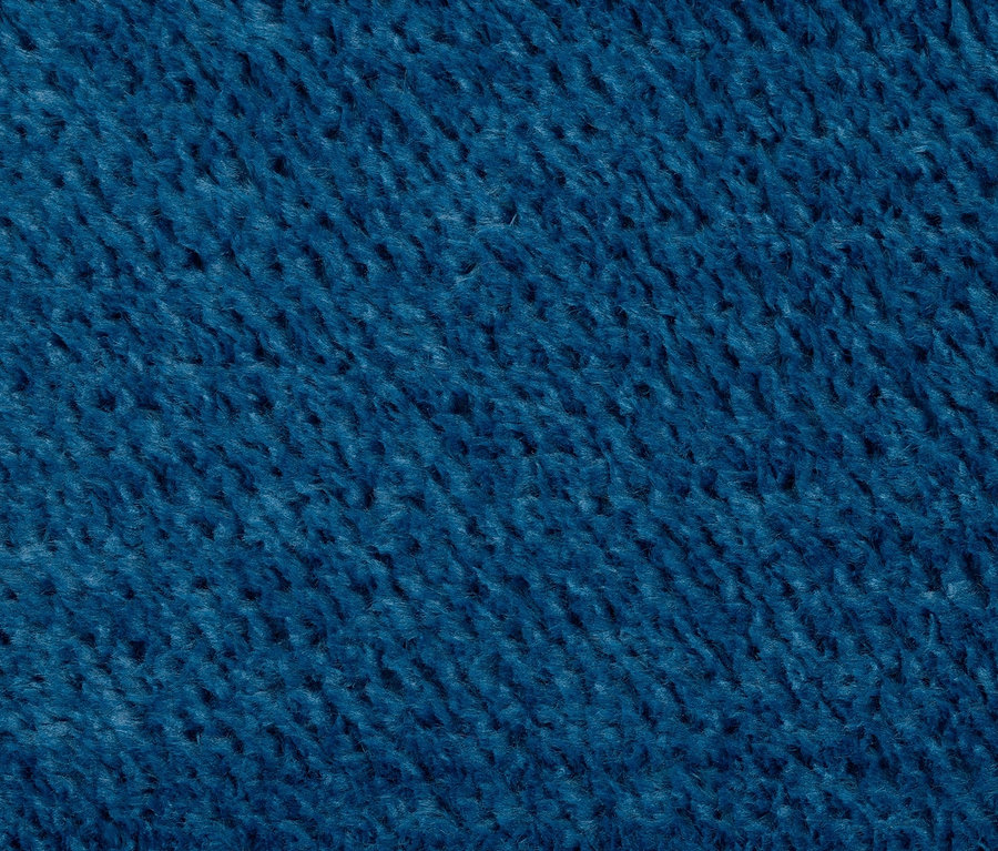 Detailaufnahme der Textur eines blauen Sessels von LOOKS by Wolfgang Joop.