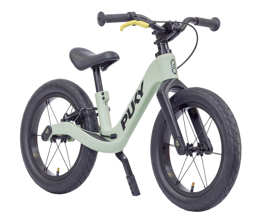Helles grünes PUKY Laufrad NEXT BUNDLE 12" und 14" mit schwarzen Reifen.