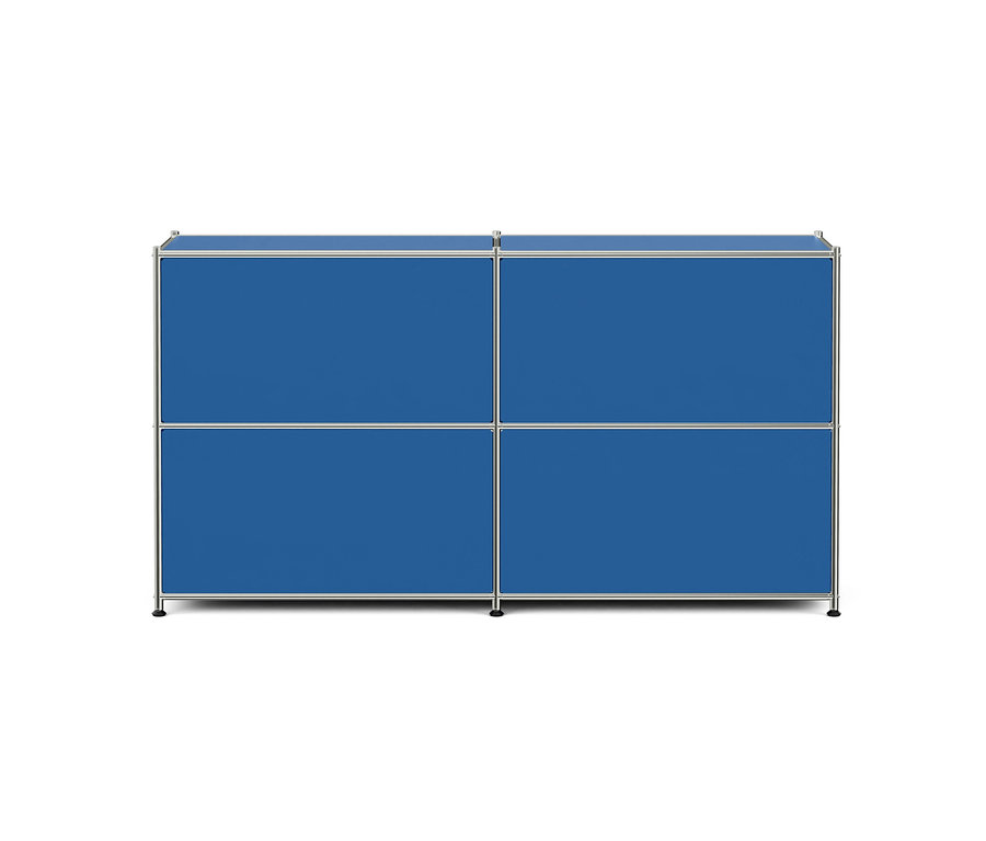 Ein blaues modulares Aufbewahrungsmöbel mit silbernem Rahmen, bestehend aus vier rechteckigen Fächern in zwei Reihen und zwei Spalten, auf weißem Hintergrund.