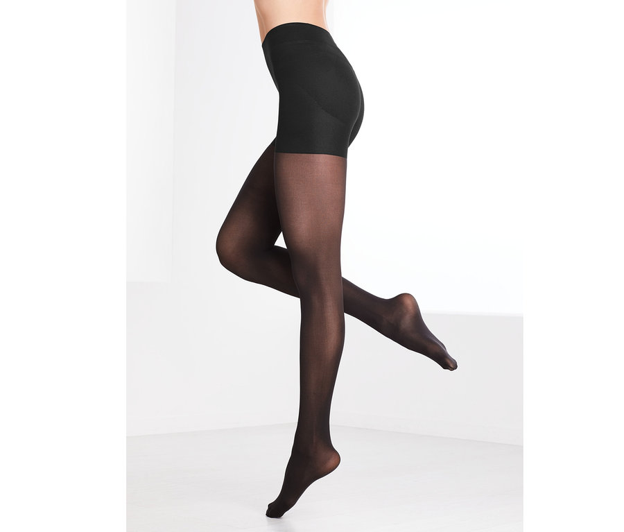 Beine einer Frau in einer schwarzen Bodyforming-Strumpfhose.