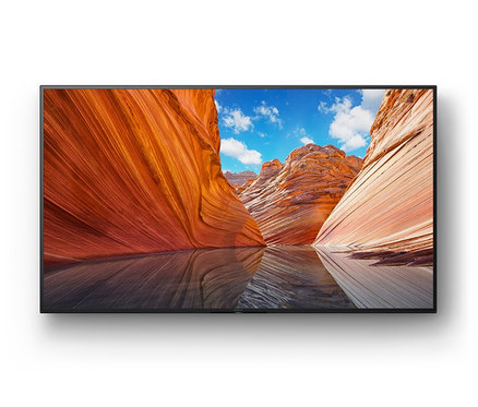 Ein schwarzer Sony KDX80JAEP Fernseher zeigt eine Wüstenlandschaft.