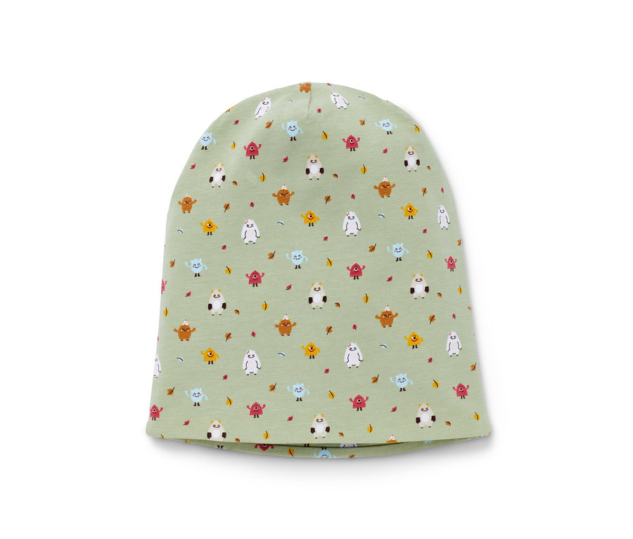Eine grüne Mütze mit Monster-Print.