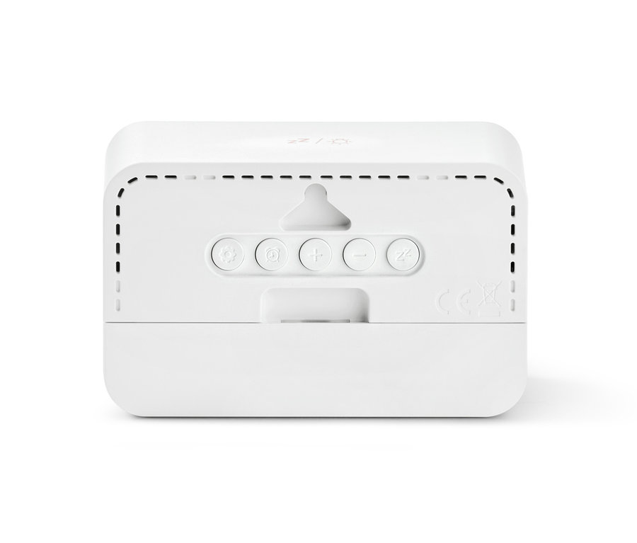 Detail der Rückseite eines digitalen LCD-Weckers mit Bedienknöpfen.