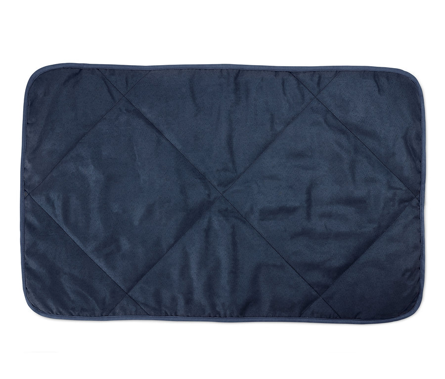 Eine blaue Hunde-Kuscheldecke mit Steppmuster.