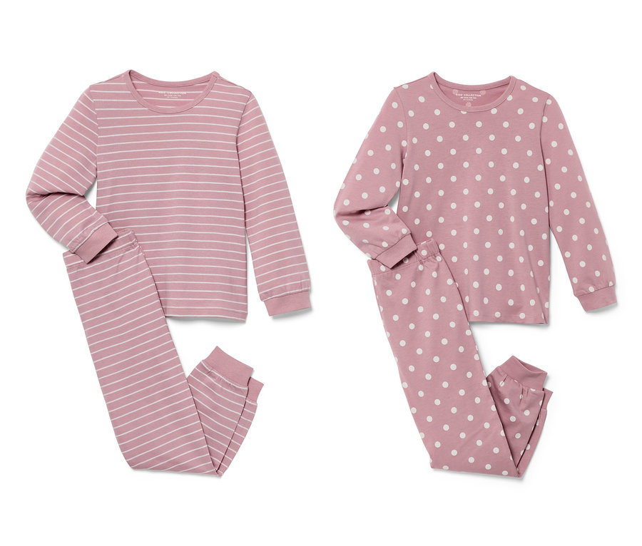 Zwei rosa Kinder-Pyjamas, einmal gestreift, einmal gepunktet.