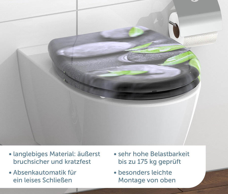 Detail einer weißen Toilette mit Duroplast WC-Sitz Stone mit Steinmotiv.