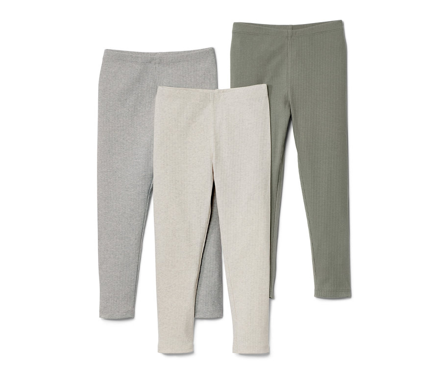 Drei gerippte Leggings in Grau, Beige und Grün.