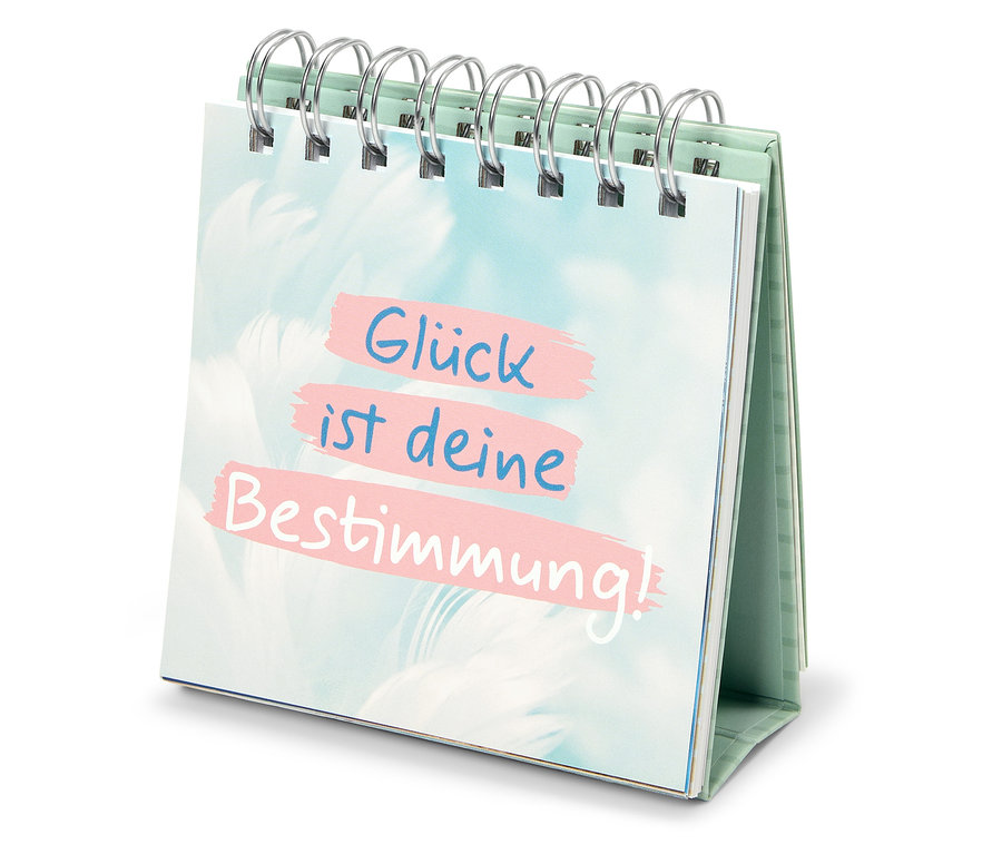 Tischkalender zeigt den Spruch "Glück ist deine Bestimmung!"