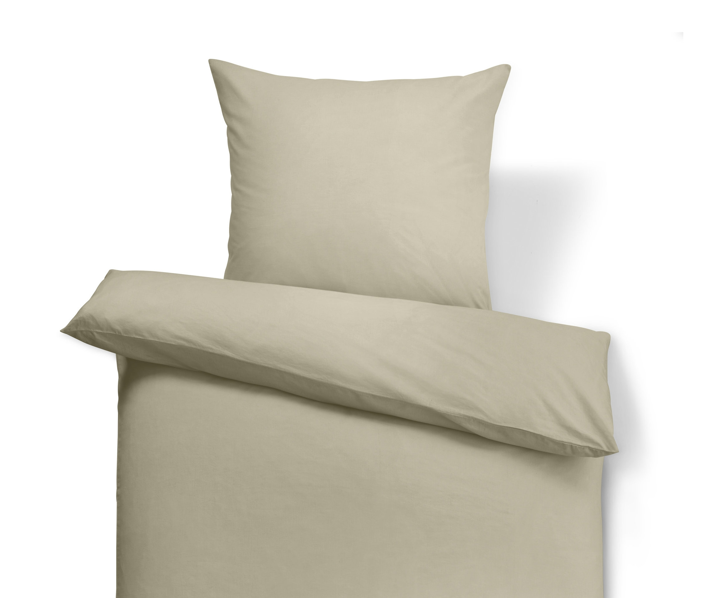 Hellbraune Baumwoll-Leinen-Bettwäsche mit Kissen oben.