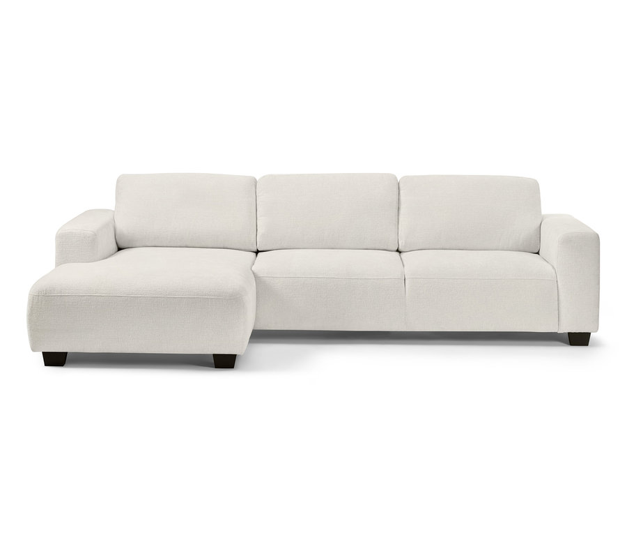 Ein cremefarbenes Ecksofa, links.