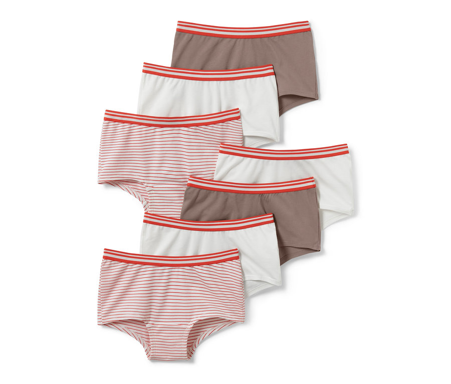 Sieben Kinder-Pantys: gestreift, braun und weiß, mit einem roten Streifen am Bund.