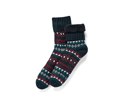 Zwei dunkelblaue Hausschuhsocken mit Norwegermuster.