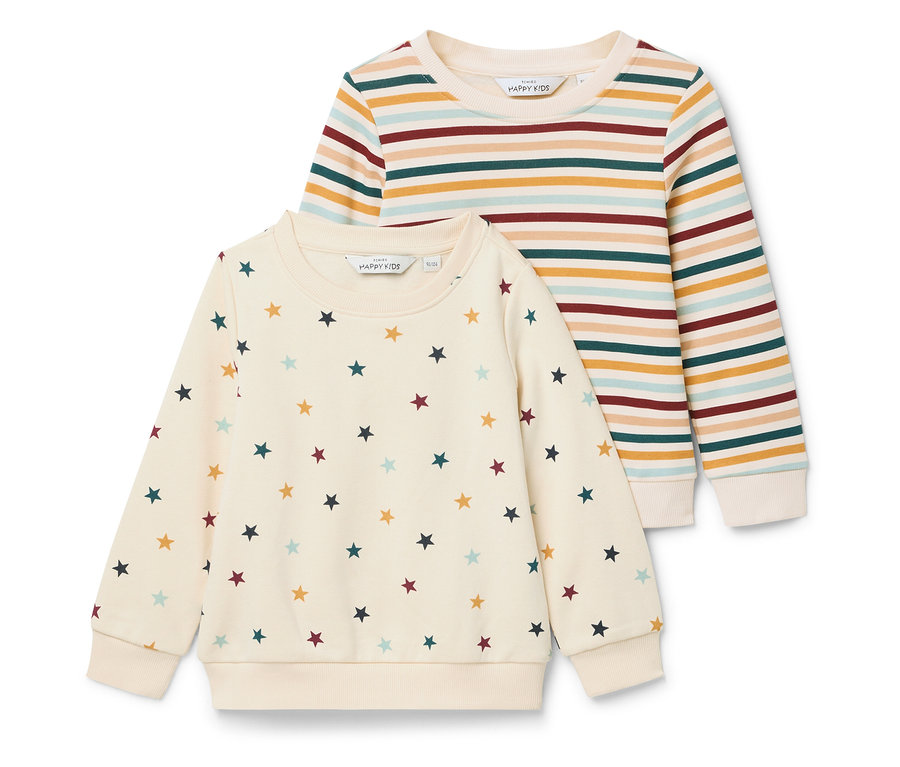 Zwei Happy Kids Pullover: Einer mit Sternenmuster, der andere mit bunten Streifen.