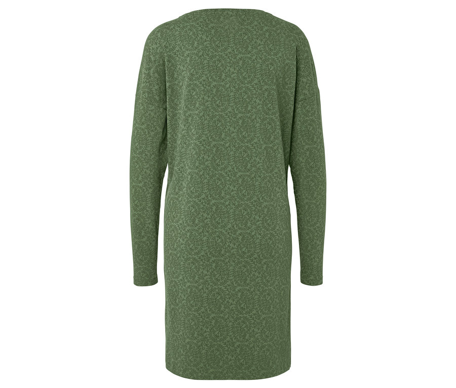 Von hinten ist ein grünes, langärmeliges Kleid mit Blattmuster zu sehen.