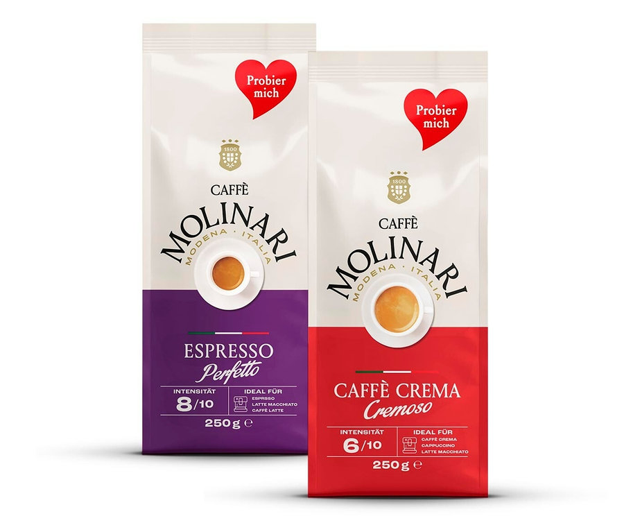 Zwei Packungen Caffè Molinari, eine Espresso Perfetto und eine Caffè Crema Cremoso.