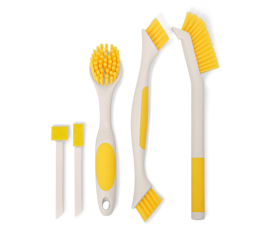 Fünf Reinigungsbürsten mit gelben Borsten und Griffen liegen auf einem weißen Hintergrund.