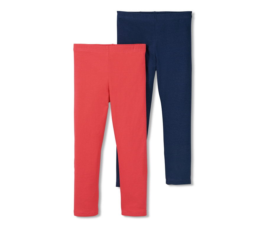 Zwei Leggings: eine korallenrote und eine dunkelblaue.