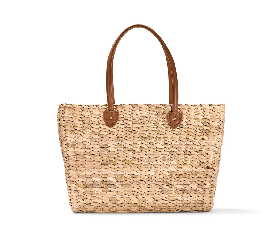 Ein hochwertiger Kühlkorb mit braunen Ledergriffen.