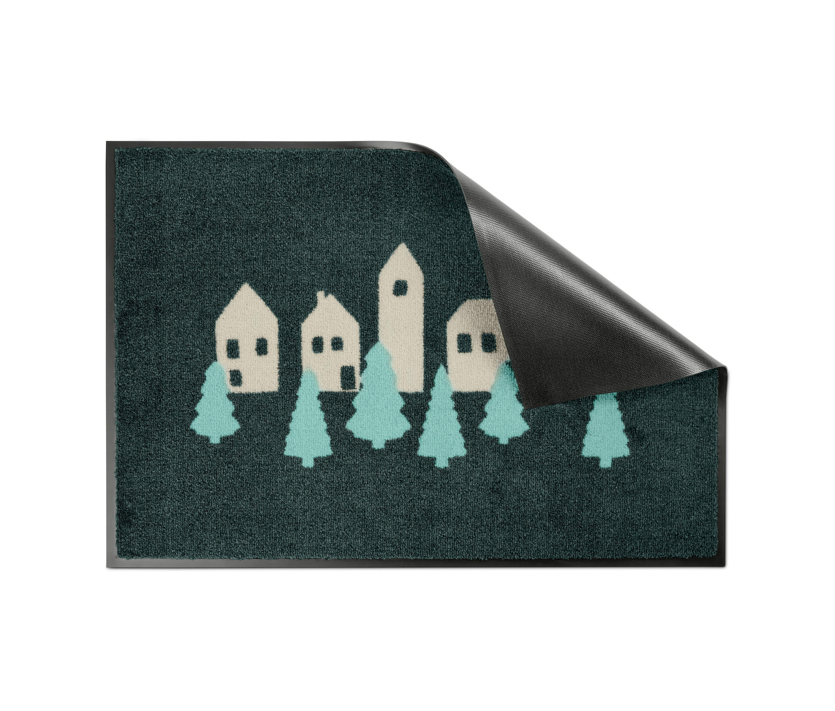 Eine Fußmatte aus Textil mit Häusern und Weihnachtsbäumen.
