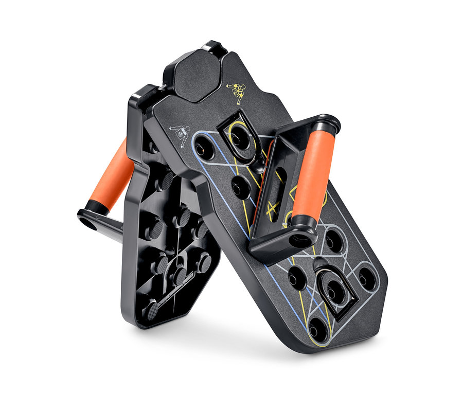 Zusammengeklapptes Liegestütz-Board mit Elastikbändern in Schwarz mit orangefarbenen Griffen.