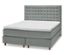 Ein hellgraues Scapa Boxspringbett mit einem weißen Topper.
