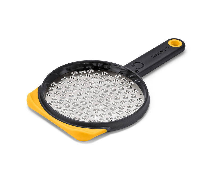 Nahaufnahme einer 2-seitigen Schnellreibe mit schwarzem Griff und gelben Akzenten.